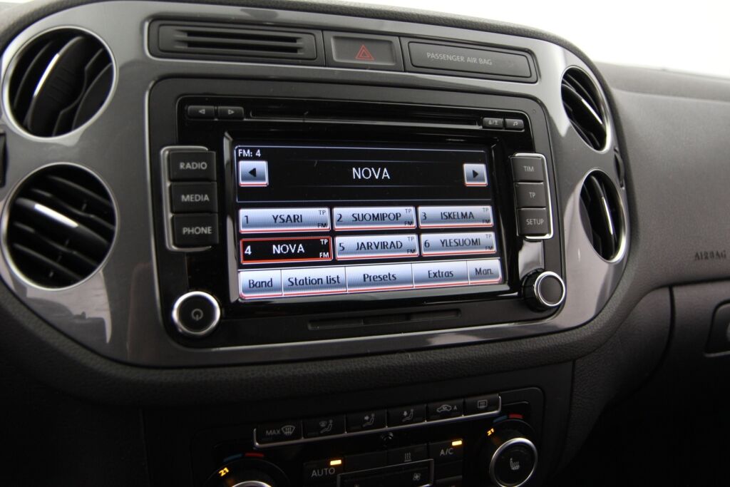 Volkswagen Tiguan 2014 Trend Limited 1,4 TSI 90 kW (122 hv) BMT / 2-om. Suomiauto / Exclusive-paketti / Webasto / Vetokoukku