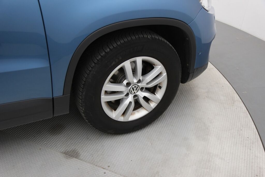 Volkswagen Tiguan 2014 Trend Limited 1,4 TSI 90 kW (122 hv) BMT / 2-om. Suomiauto / Exclusive-paketti / Webasto / Vetokoukku
