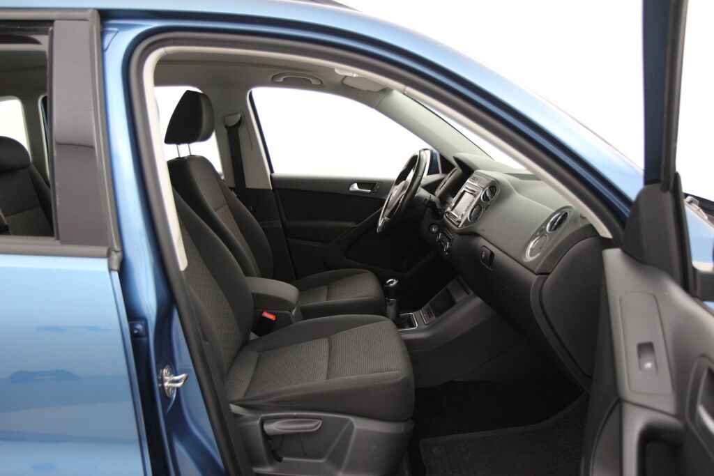 Volkswagen Tiguan 2014 Trend Limited 1,4 TSI 90 kW (122 hv) BMT / 2-om. Suomiauto / Exclusive-paketti / Webasto / Vetokoukku