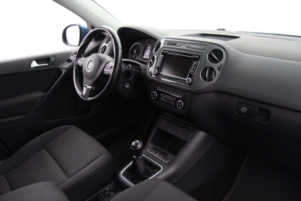 Volkswagen Tiguan 2014 Trend Limited 1,4 TSI 90 kW (122 hv) BMT / 2-om. Suomiauto / Exclusive-paketti / Webasto / Vetokoukku