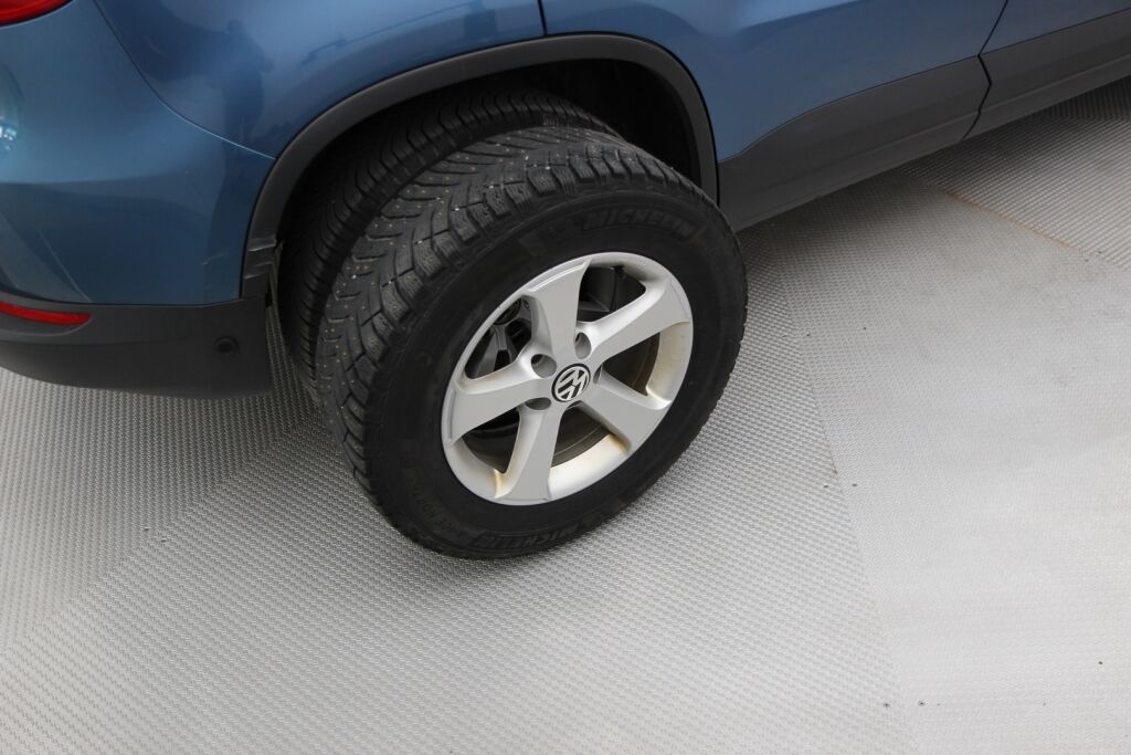 Volkswagen Tiguan 2014 Trend Limited 1,4 TSI 90 kW (122 hv) BMT / 2-om. Suomiauto / Exclusive-paketti / Webasto / Vetokoukku